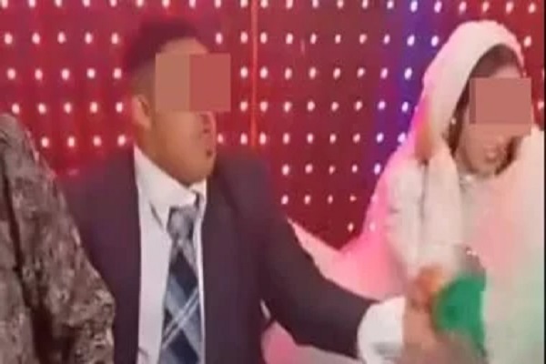 خبير قانوني: مقاضاة كل من نشر فيديو العريس المصاب بمتلازمة داون